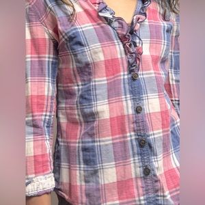 Plad pink and purple button down shirt.